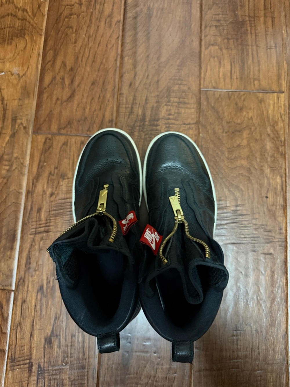 Women’s Nike Jordan Black High-Top Sneakers with Gold Zipper